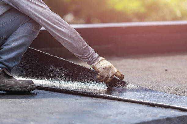 Professional Waterproofing technician working in Star City, IN